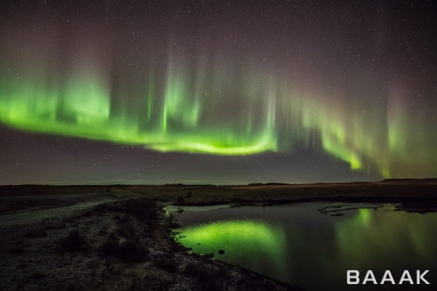 تصویر-جزیره-یخ-زده-در-شب-و-آسمان-با-نور-سبز_279253326